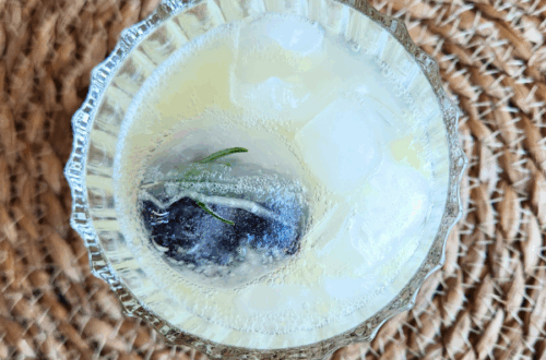 Sparkling lemonade mocktail with rosemary and blueberries